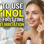 Realistic YouTube thumbnail showing a woman applying retinol with healthy glowing skin and bold text “How to Use Retinol for the First Time Without Irritation” in a high-contrast skincare design.